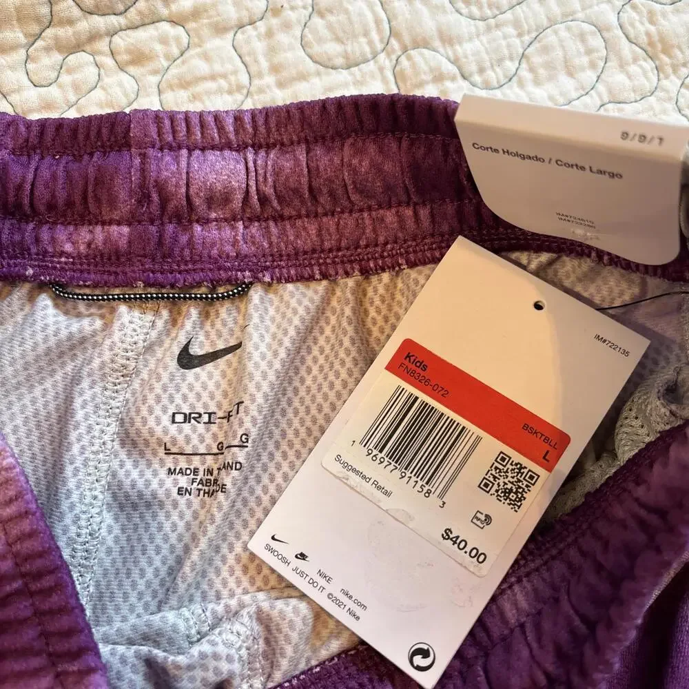 Nike Youth size‎ large Purple and silver Athletic Shorts